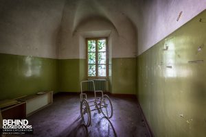 Manicomio di Colorno, Italy - Wheelchair in a room