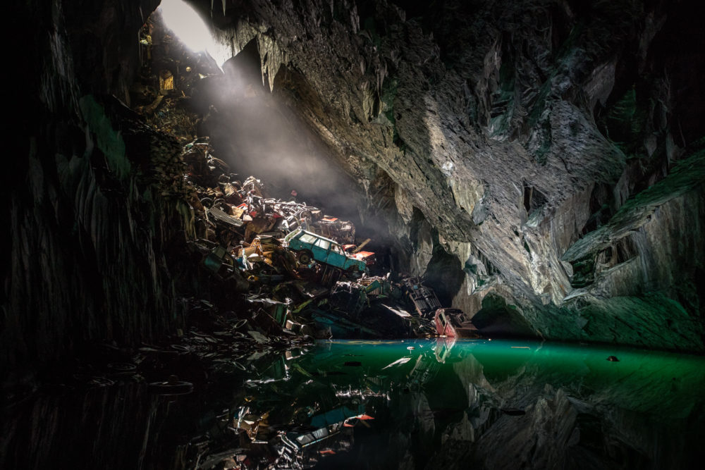 Cavern of the Lost Souls - Light shines onto the car pile