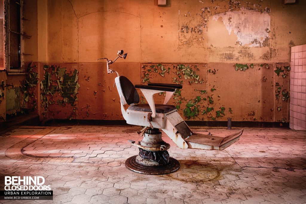 Beelitz Heilstätten Bath House - Dentist chair in red room