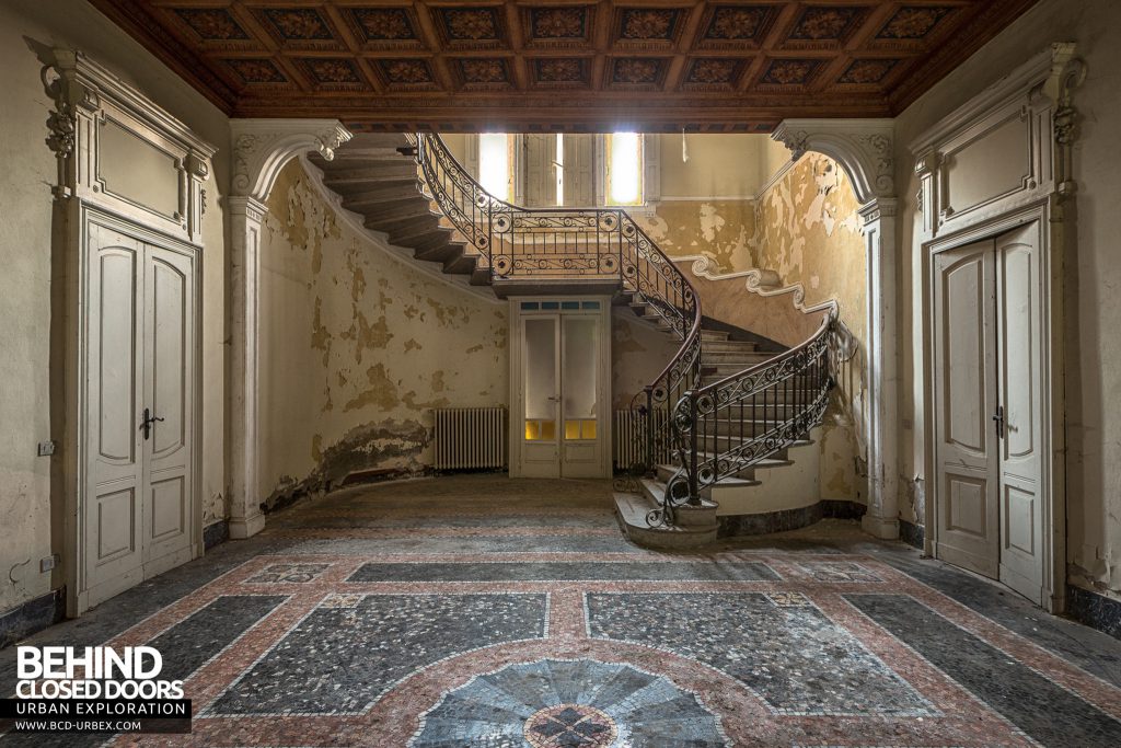 Villa Margherita, Italy - Ornate entrance hall with mosaic tiles floor and wood ceiling