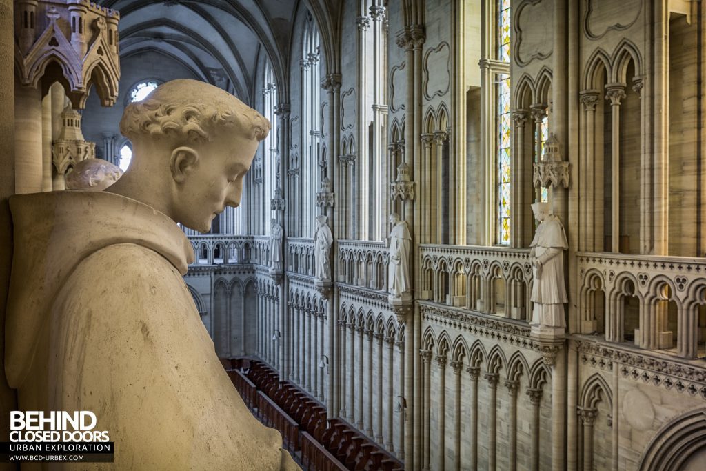 Chapelle des Pelotes, France - Detail of statue with chapel behind