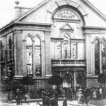 Locals examining the fire damaged chapel