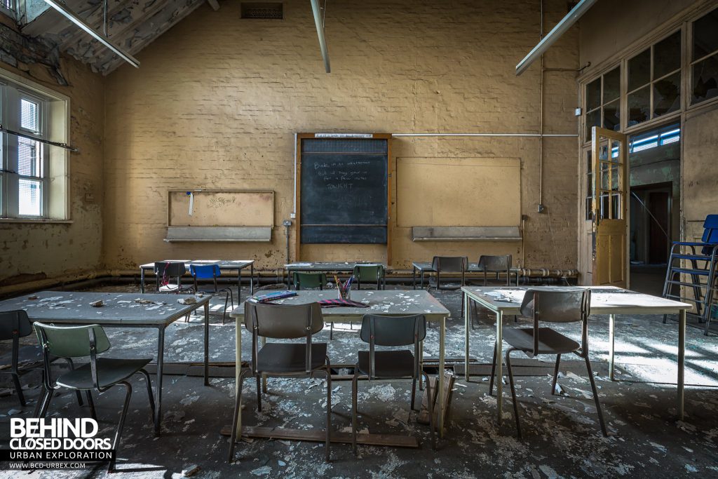 St John the Baptist School, Wigan - Class with chairs and tables facing blackboard