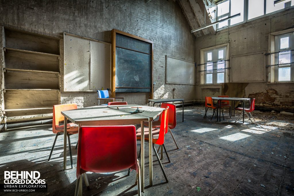 St John the Baptist School, Wigan - Classroom for infants with chairs and hexagonal desk